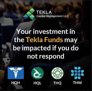 A group of people sitting in a room

Description automatically generated