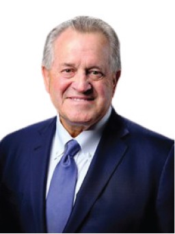 A person in a suit and tie

Description automatically generated with medium confidence