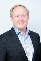 A picture containing person, person, suit, posing

Description automatically generated