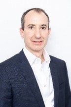 A person in a suit

Description automatically generated with low confidence