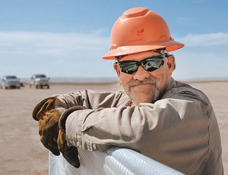 A person wearing a hat
Description automatically generated