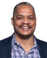 A person smiling for the camera

Description automatically generated with medium confidence