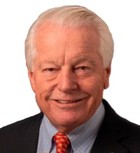 A picture containing person, person, suit, wearing

Description automatically generated