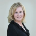 A person with blonde hair  Description automatically generated with medium confidence